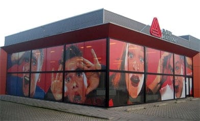 One way vision film pasted on the glass facade of a large building
