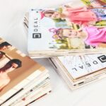 Stack of 5 mm thick sunboard prints with a photo vinyl print mounted on top to create wall posters for a retail clothing store