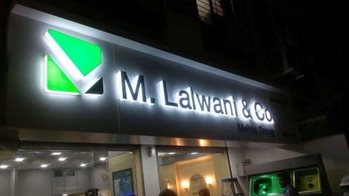 3D acrylic letter board with LEDs for the M Lalwani & Co. shop sign