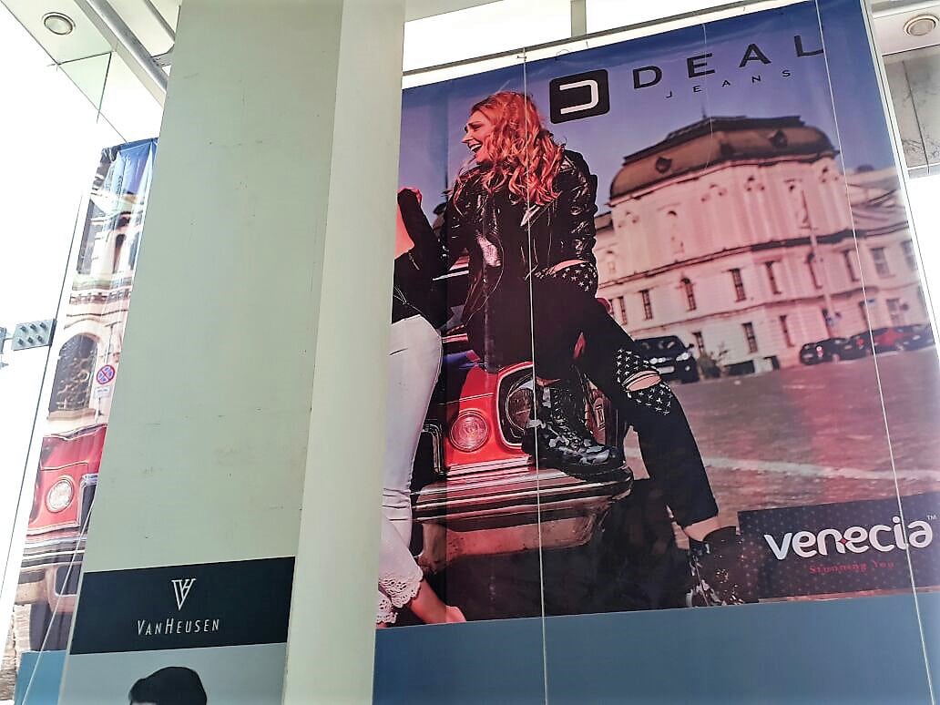 large sized frontlit flex printed hoarding fixed in a mall