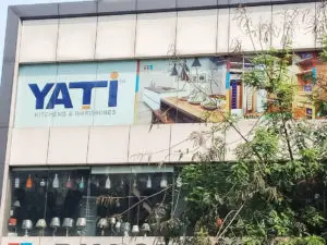 digital printing on frosted glass film pasted on the first floor of a building facade for the YATI company