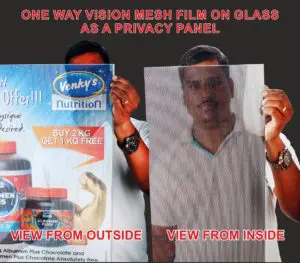 one way vision film acting as a privacy panel. When you view from outside you can only see the printed images wheras people on the inside can look out