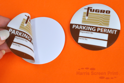parking stickers printed and cut in circles and other shapes