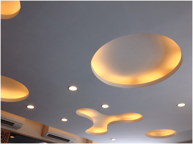Interesting POP ceiling design with recessed lights in a restaurant