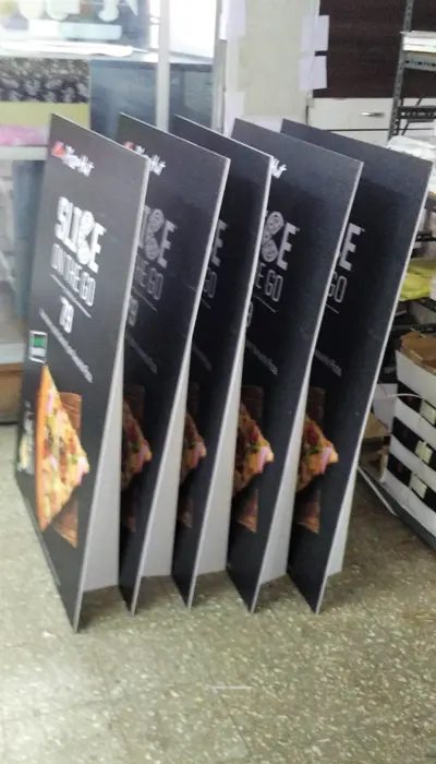 5 sunboard standees placed one behind the other as a low cost lightweight display solution