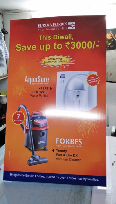 rigid sunboard stand made of PVC showing an ad for Eureka Forbes products