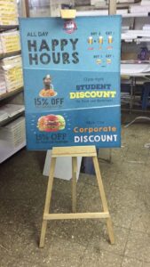 wooden easel standee to garner customer attention