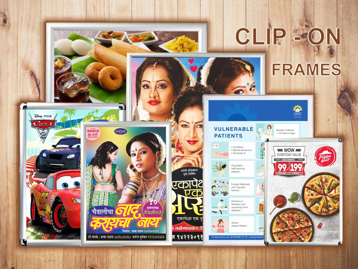 a collection of aluminium clip on boards which display posters in a refined and elegant manner