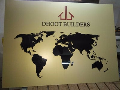 This image shows an acrylic shop board for the Pune-based construction company, Dhoot Builders.