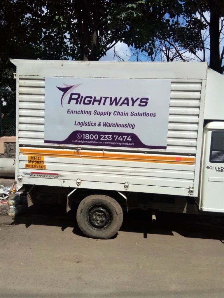 Rightways Co vehicle branding using UV printed reflective vinyl on ACP sheet bolted to the side of Tata Ace chota hathi
