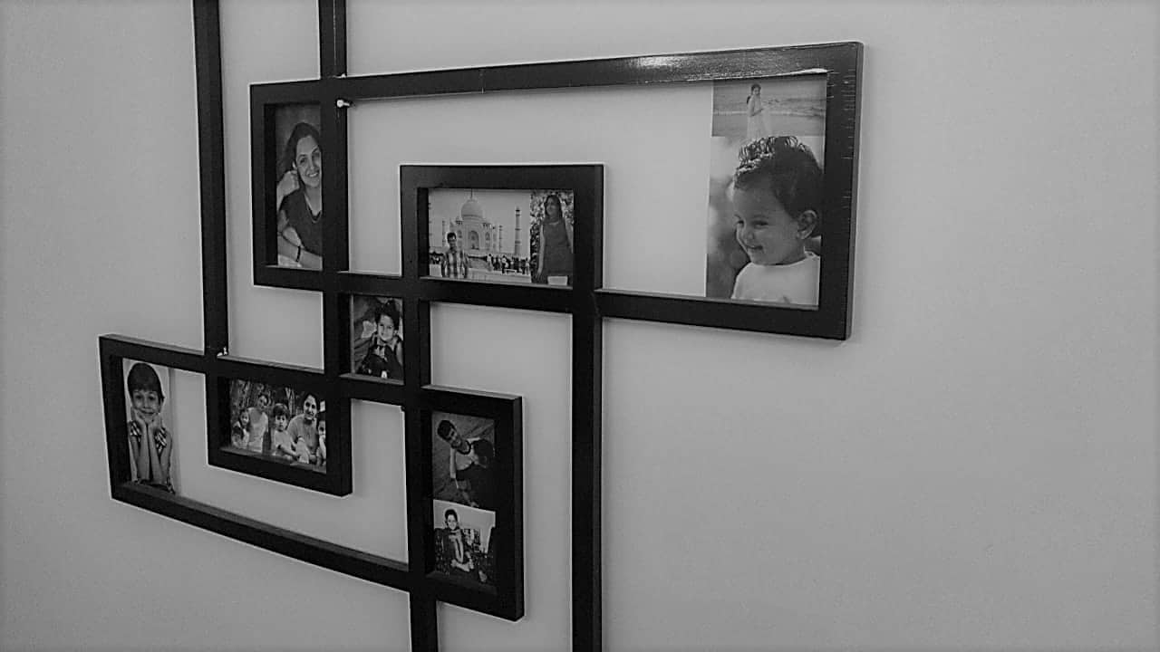 photo collage in a frame uniquely shaped in the shape of a photo
