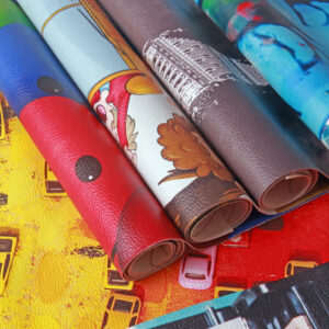 custom print on leather and roll of rexine that can be used for sofa covers and interior decoration