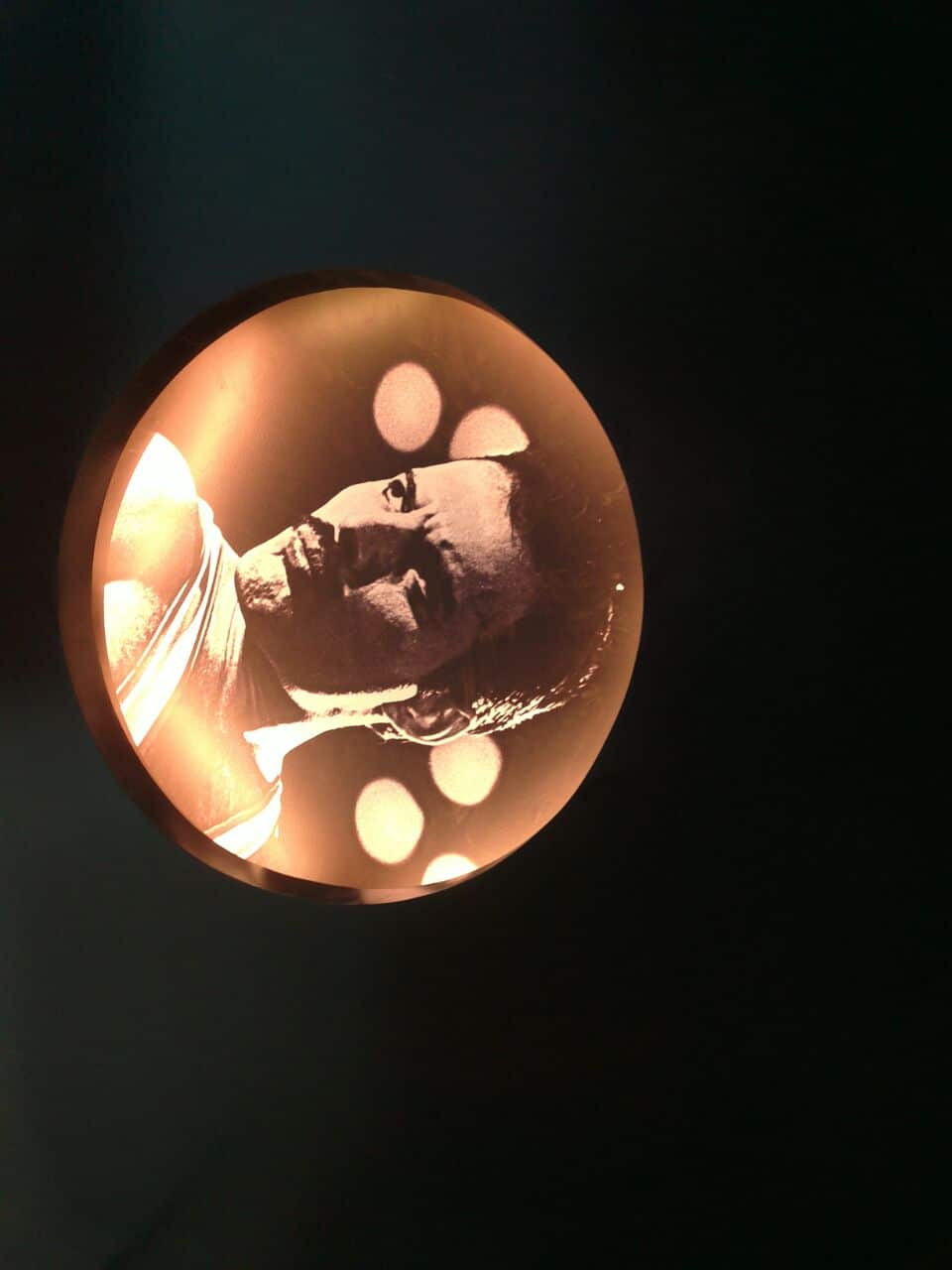 Close-up of rock star Freddie Mercury pasted in the ceiling of a music themed café as a great interior decoration idea