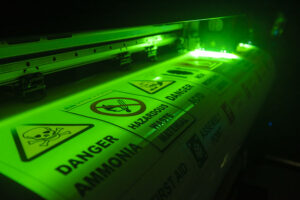 night glow safety signs being printed on a UV inkjet wide format printer
