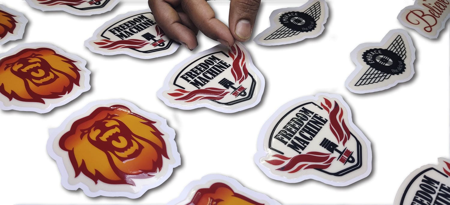 embossed, raised effect stickers, kiss cut in the shape of brand logos