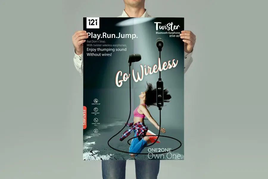 man holding up a digitally printed advertisement poster on paper