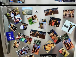 personalised fridge magnets showing images of loved ones pasted on the door of a refrigerator make for a wonderful gift
