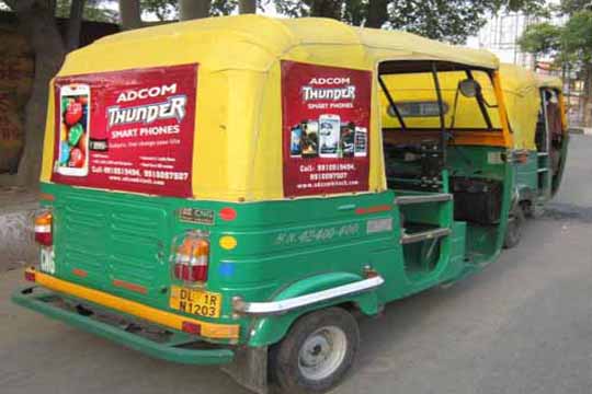low cost solvent vinyl print pasted on auto rickshaw hoods for short term ad campaigns