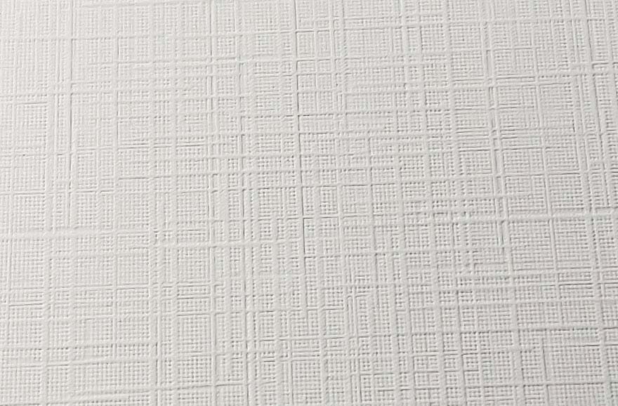 Image printed on a paper having a linen texture finish. The pattern looks very much like the weave on linen cloth