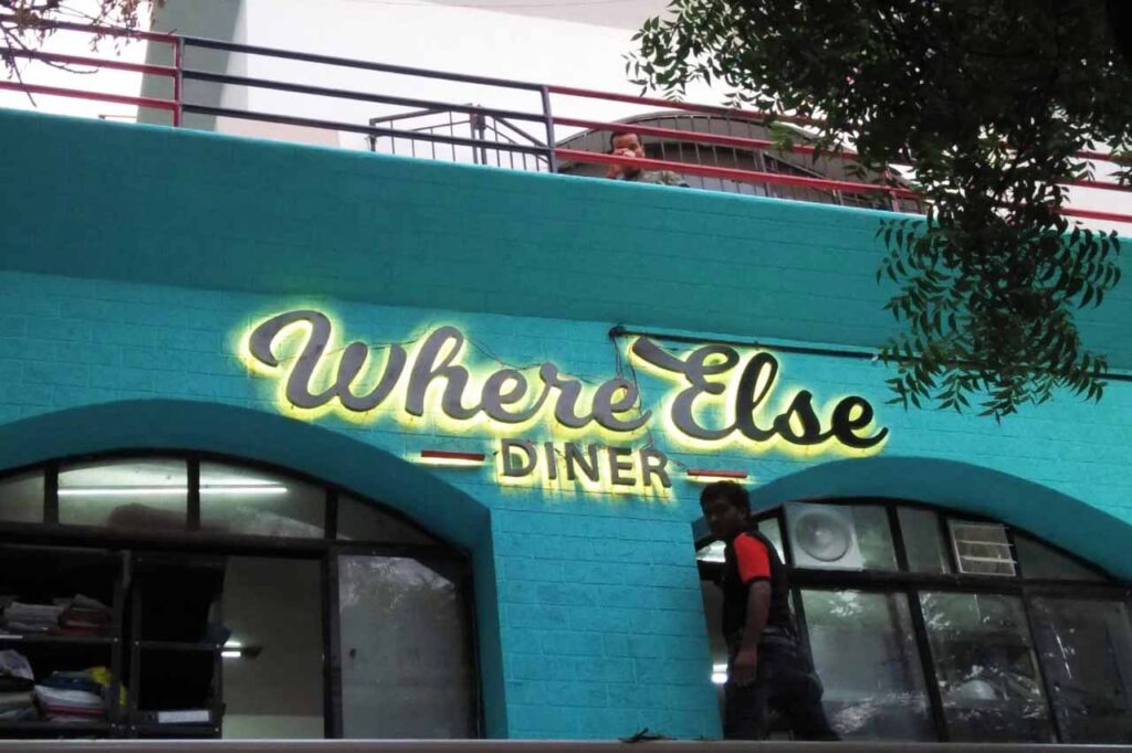 Metal letters signboard cut in the shape of the Where Else Diner logo. Yellow LEDs fitted behind the letters to give it a beautiful back glow. Metallic letters drilled directly on to the wall