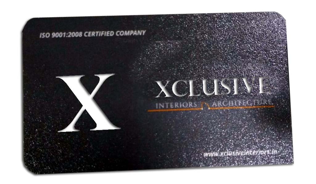 laser cut visiting card with rounded corners with Xclusive company name and logo cut through