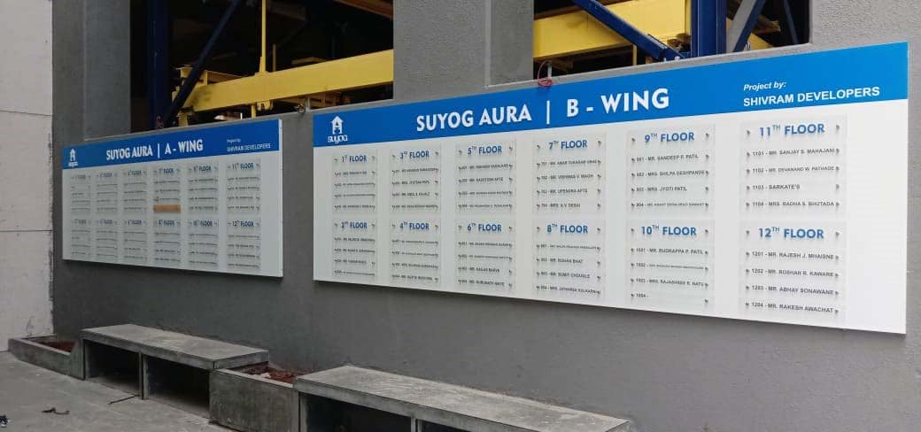 Name directory board for the residents of a co-operative housing society made of an ACP base and name plates made from clear acrylic. Individual name plates can be altered if needed