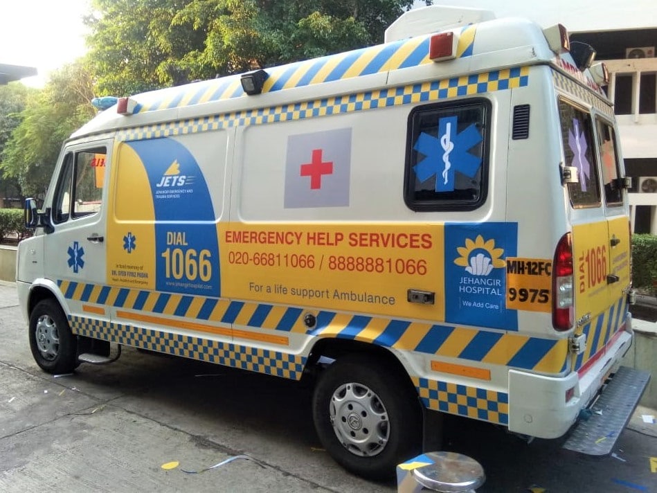 Cast vinyl prints of the Jehangir Hospital corporate colours, logo and emergency helpline pasted on their ambulance