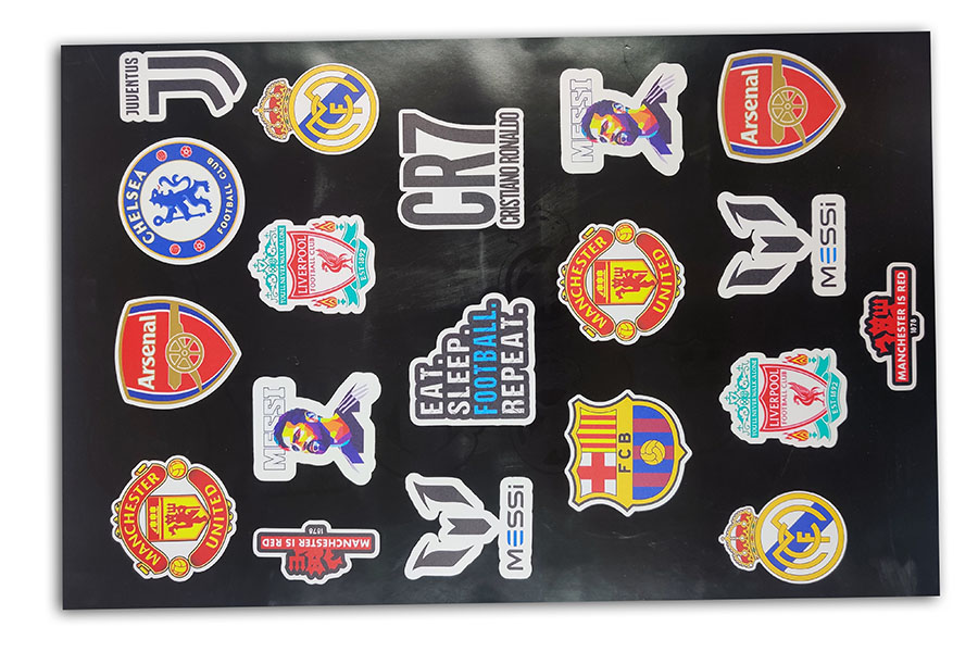 Vinyl cut stickers of different shapes and designs pasted on a black background make for a great sticker sheet for gifting