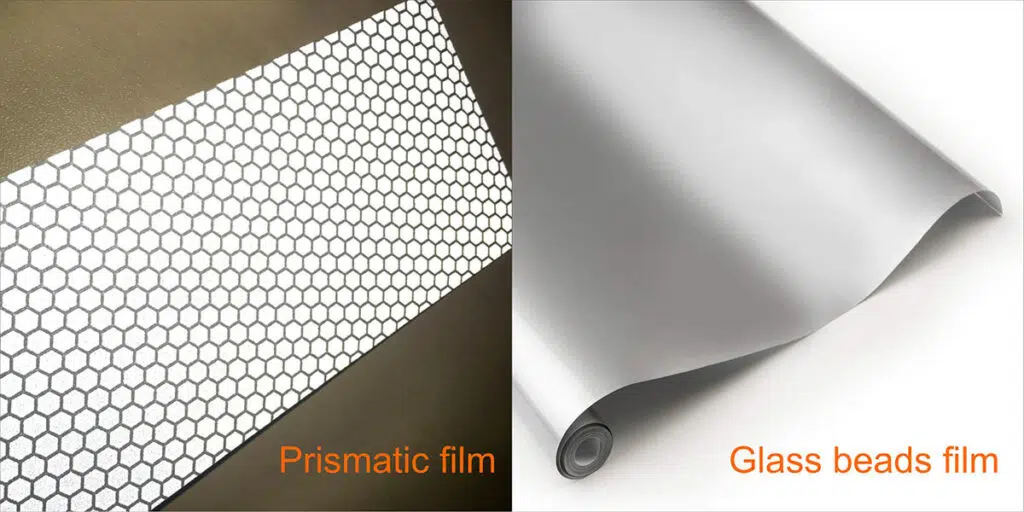 The front face of a prismatic film has large visible prisms that reflect light as against microscopic reflective balls on the glass beads film