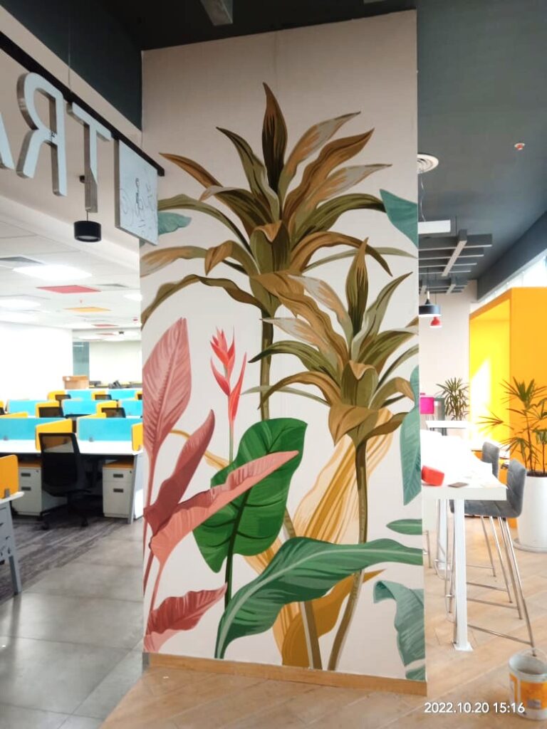 a wall print wrapped around a pillar in the office of a software company