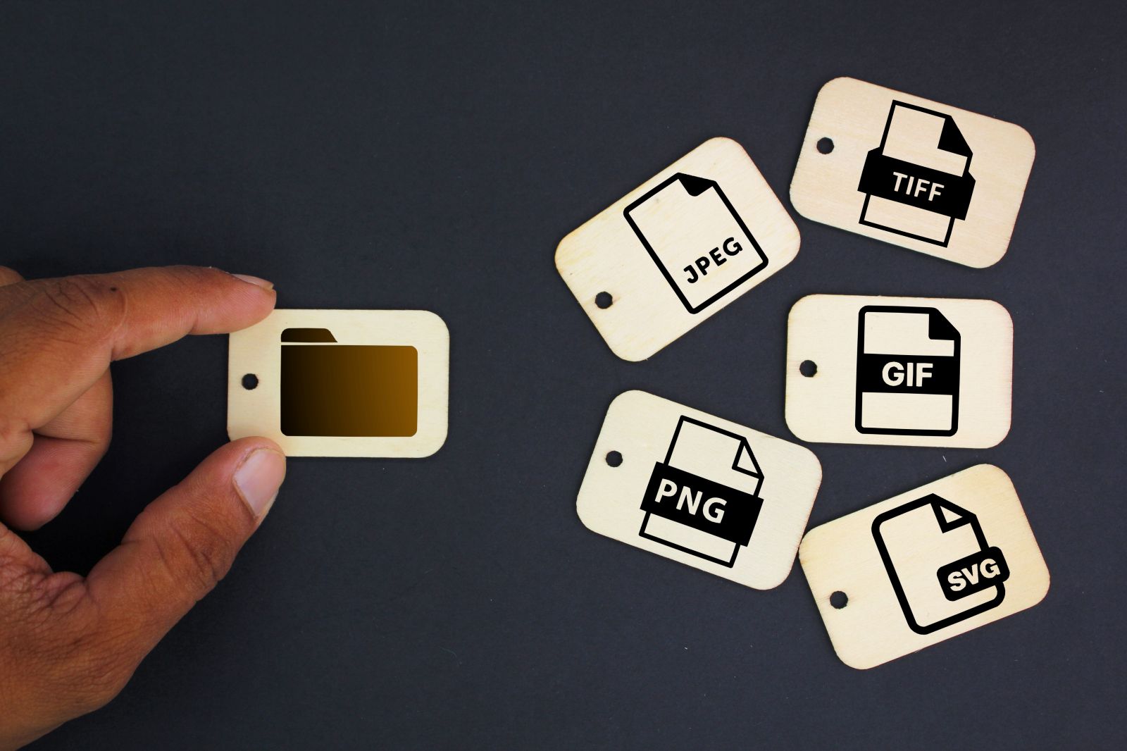 wooden tags with icons of 5 types of image files namely JPEG, PNG, GIF, TIFF and SVG