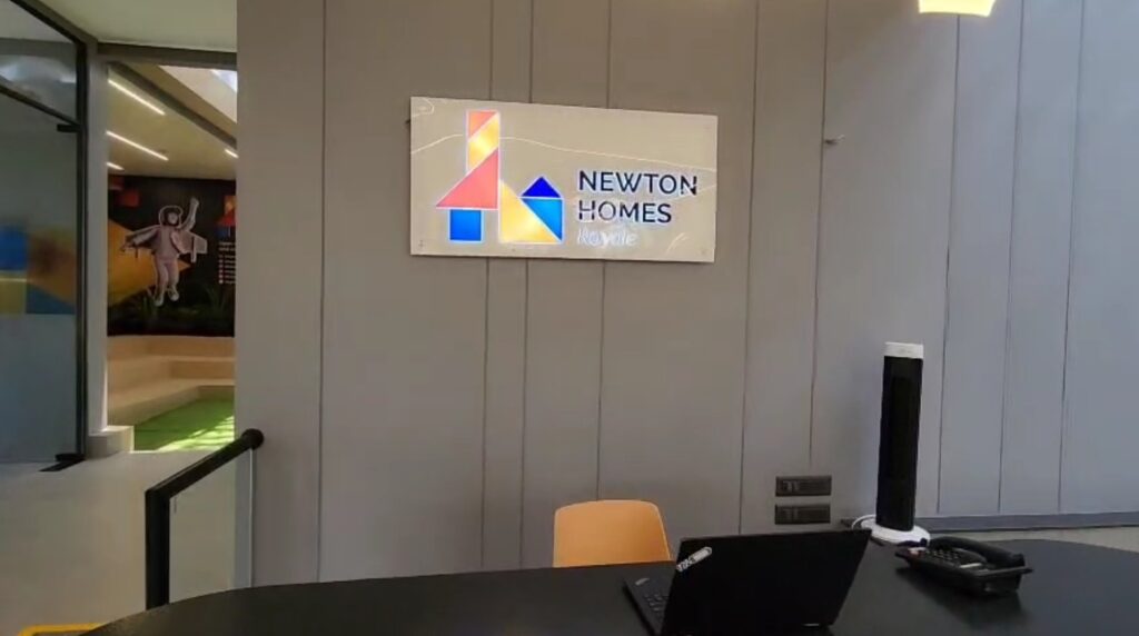 LED Acrylic Glow signboard installed in the reception area of a corporate office