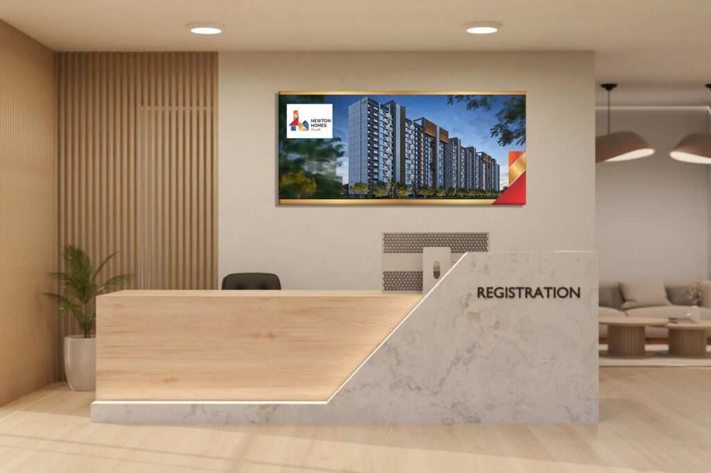 a building elevation printed on glossy acrylic photo frame and the sheet is fixed in the reception area of a very classy modern looking office of a construction company