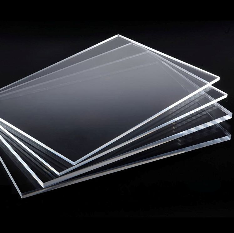 transparent acrylic photo sheets stacked on on top of another