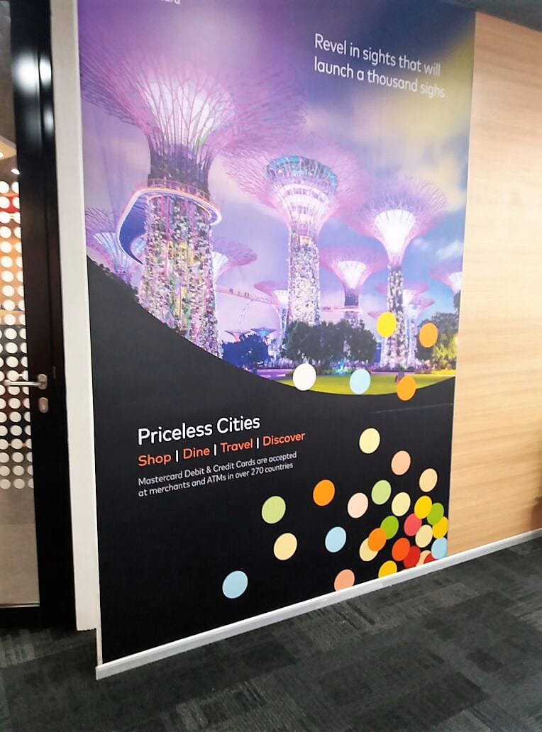 Corporate branding achieved via a custom-designed wall decal pasted in an office, showing a scene from Gardens by the Bay in Singapore