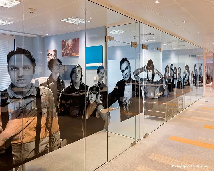 transparent glass film print pasted on the glass partition panels of a office