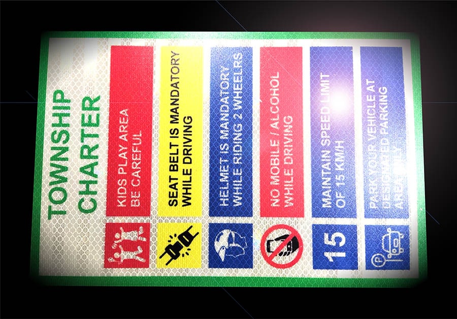 Safety sign board of a township printed on a retroreflective sheet