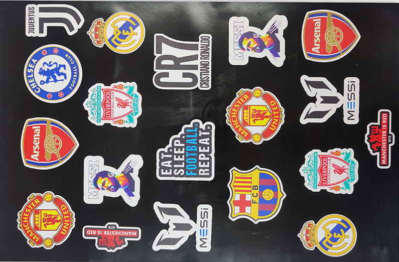 Vinyl cut stickers of different shapes and designs pasted on a black background make for a great sticker sheet for gifting
