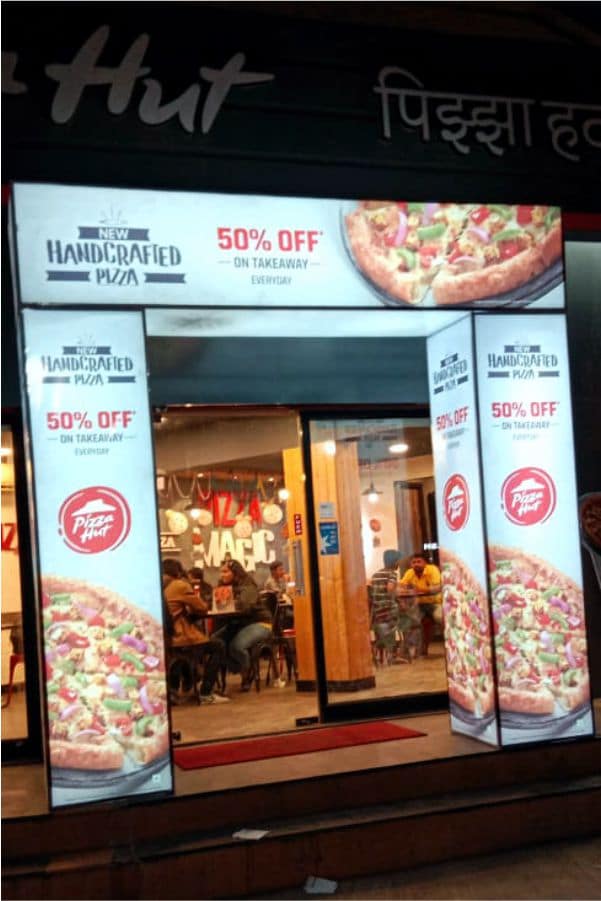 A back lit glow sign board or GSB for short is a box with tube lights and flex stretched, thereon. Its used mainly for the shop’s main board