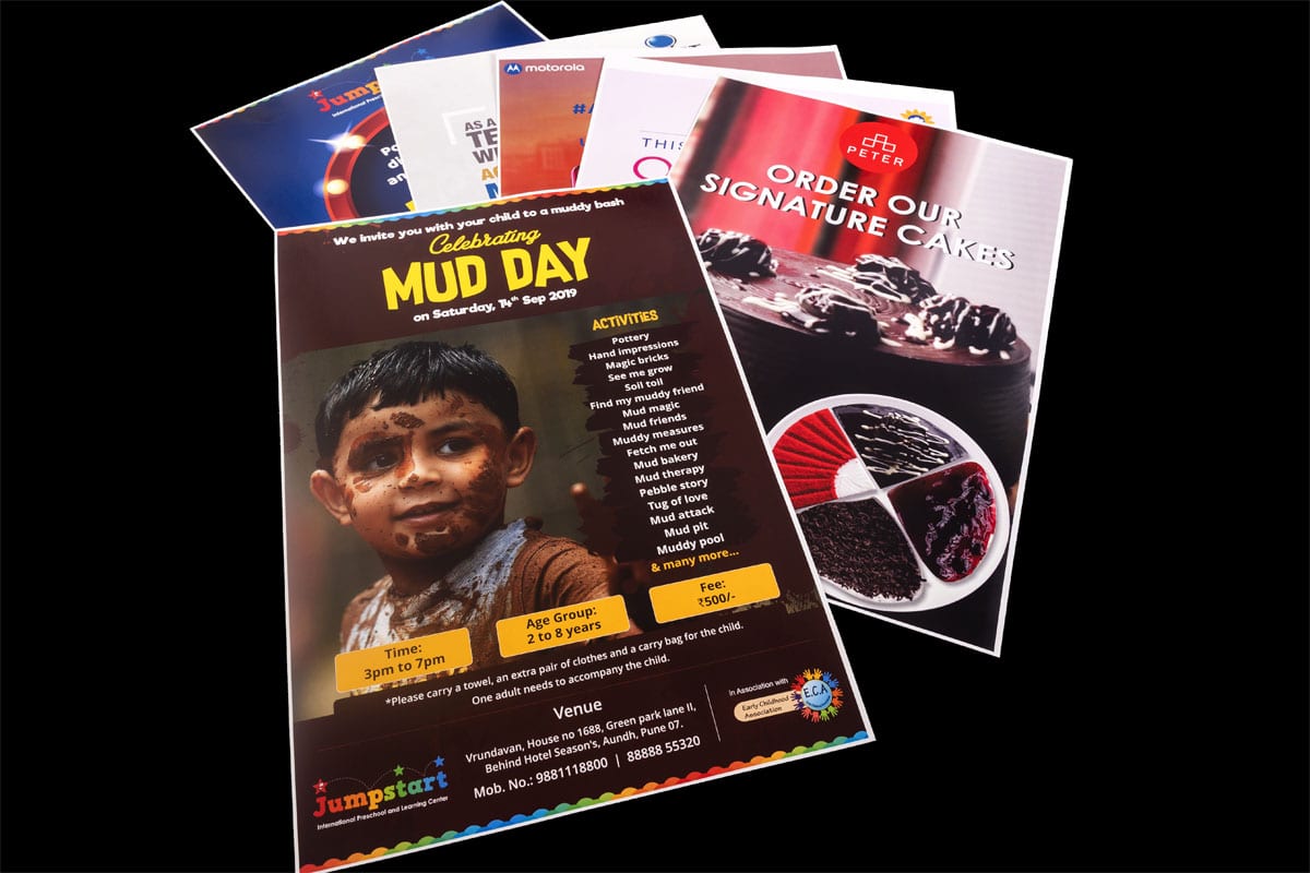 advertising posters printed on paper and laid out on display. Low cost posters for presentation on school notice boards