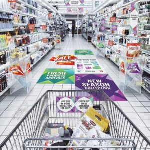 Retail Store Branding Signage with Floor Graphics, Hanging Banners and Promotional Display Solutions by Orchid Digitals