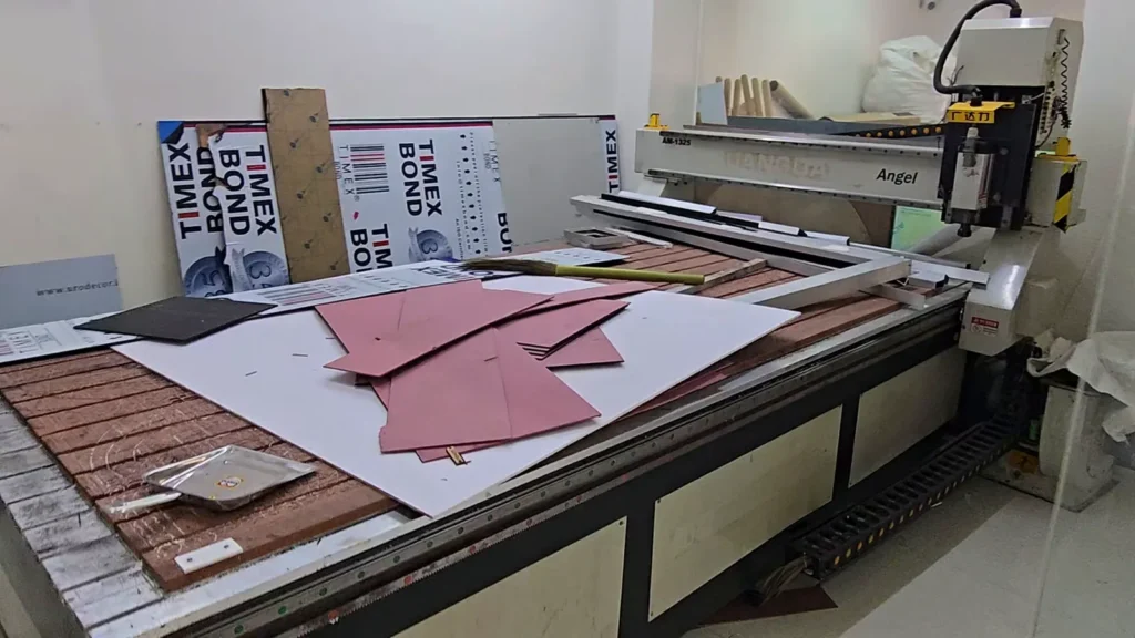 CNC router with ACP and acrylic sheets at Orchid Digitals