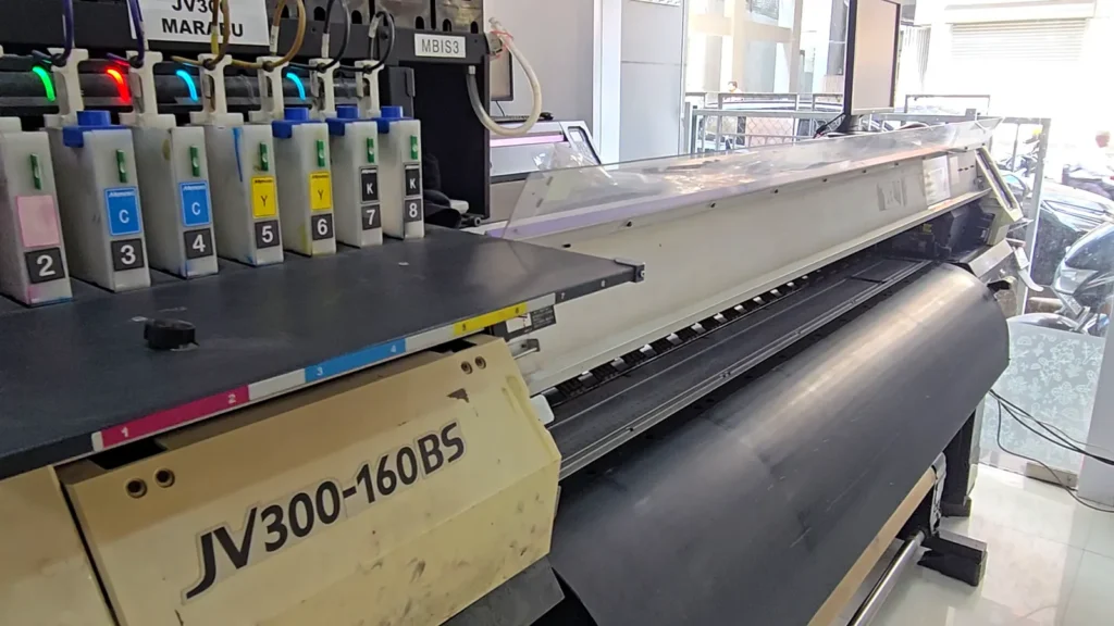 Mimaki JV300 eco-solvent printer with its ink system
