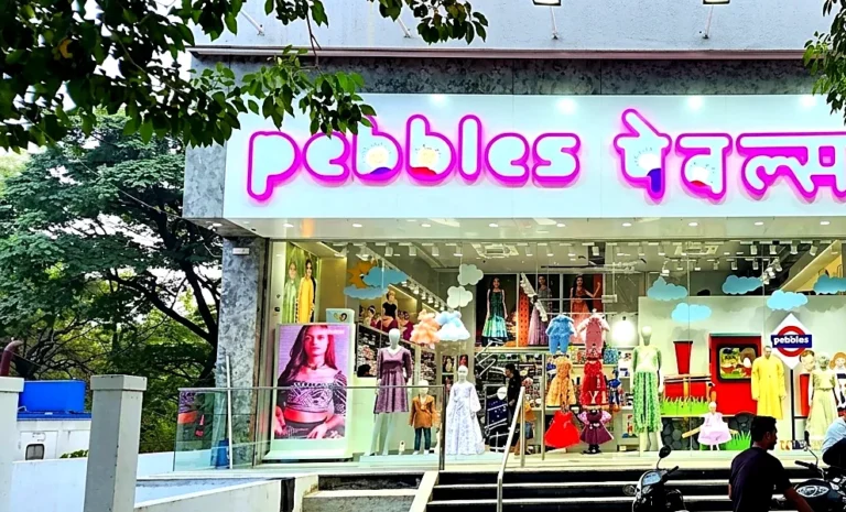 Pebbles store front on MG Road with dual-tone 3D acrylic letters