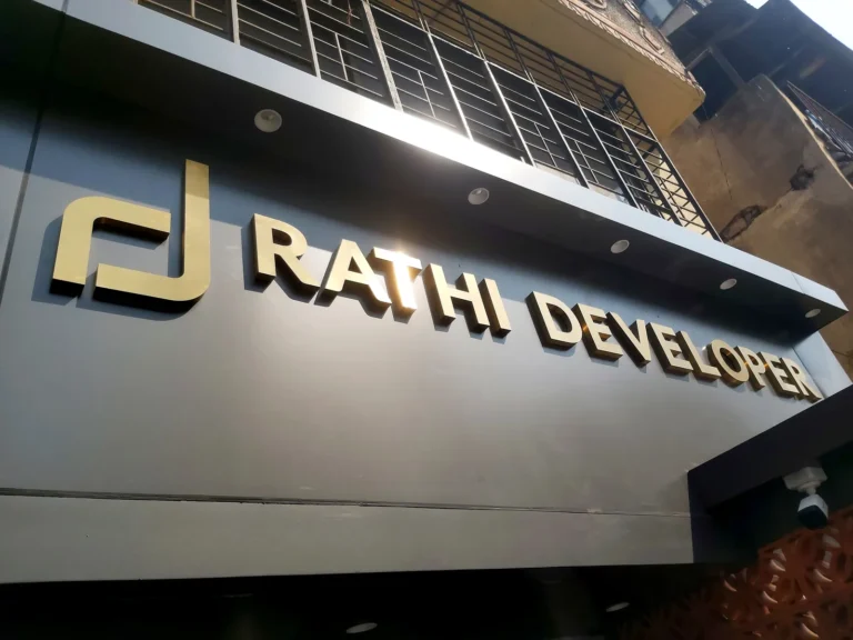 Close-up of the office letters: 1 inch deep gold steel letters sitting flush on the ACP