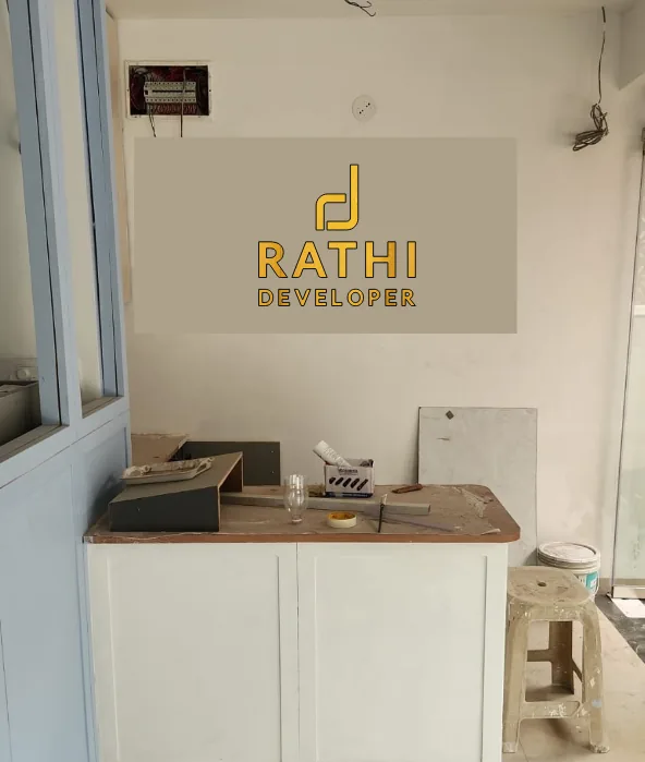 Our proposal render of the gold Rathi Developer logo in the office reception (we have no photo of it installed)