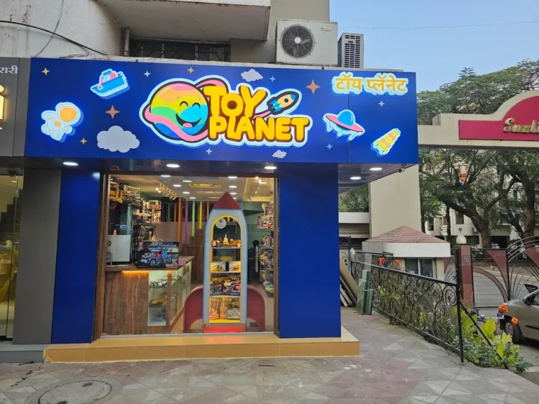 The larger Toy Planet face by day, over the shop entrance (photo from Toy Planet’s Google listing)