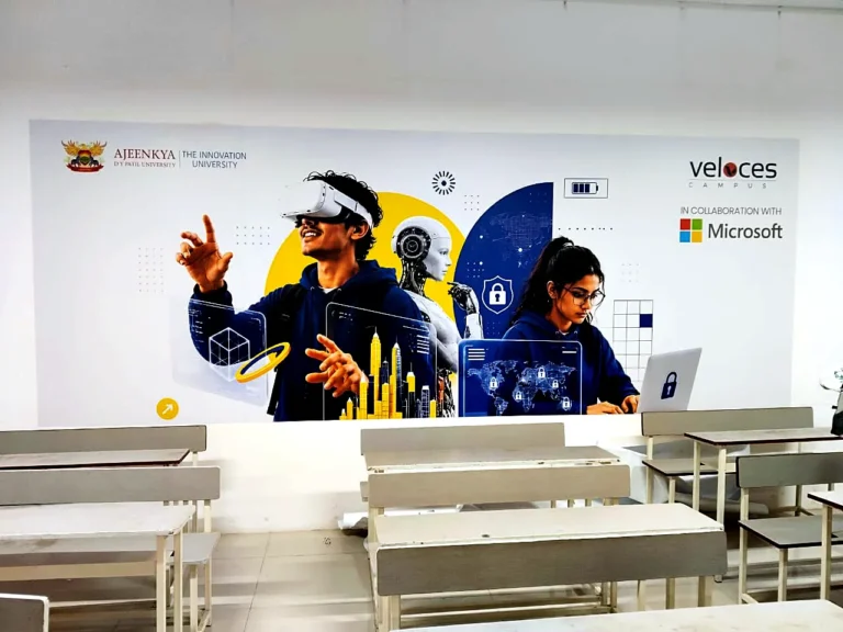 Full-wall classroom print for Veloces Campus with Microsoft and Ajeenkya DY Patil University branding