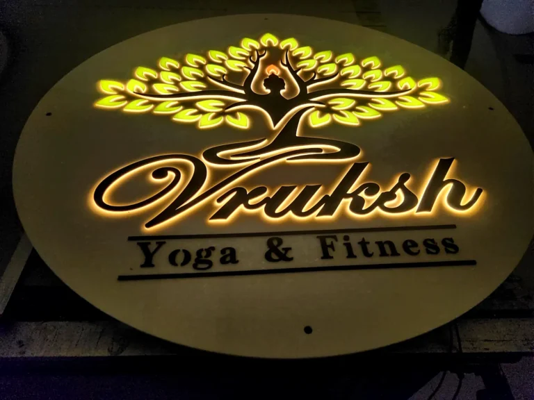 Vruksh Yoga and Fitness tree logo board glowing gold